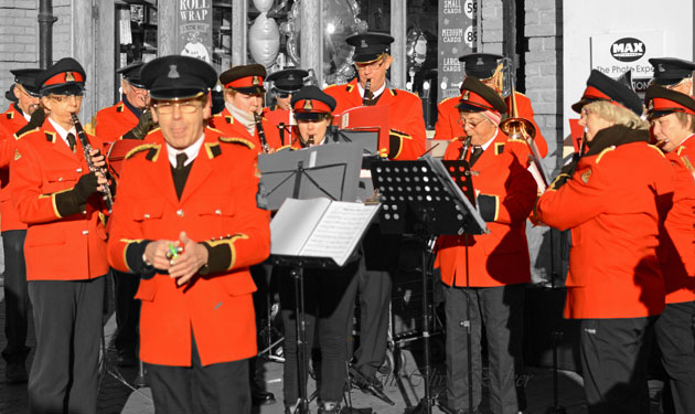 Brass band in Red tunics