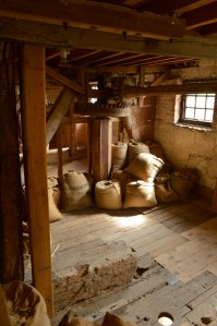 Stacks of sacksof flour on the floor of the mill